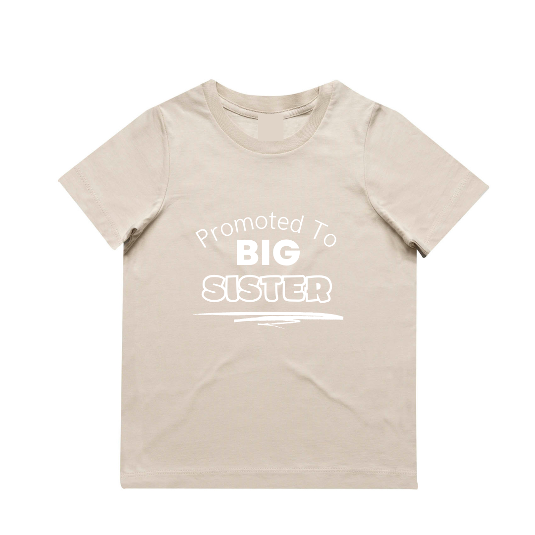 MLW By Design - Promoted To Big Sister Tee | Various Colours